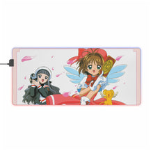 Cargar imagen en el visor de la galería, Alfombrilla de ratón con LED RGB (alfombrilla de escritorio) de Cardcaptor Sakura Sakura Kinomoto, Tomoyo Daidouji y Keroberos
